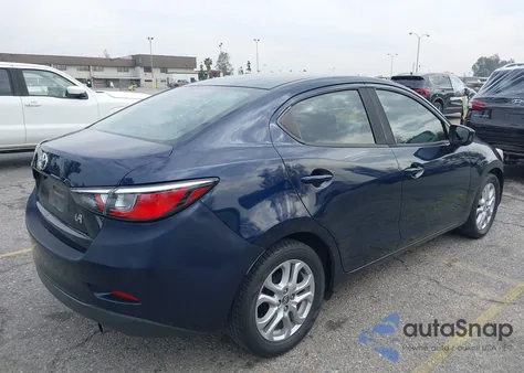 2017 Toyota Yaris Ia из США, поврежденный, VIN 3MYDLBYV6HY185047